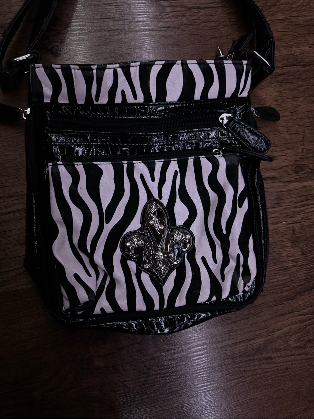 Zebra-Print Crossbody Bag with Fleur-de-Lis Accent - Black & Light Pink